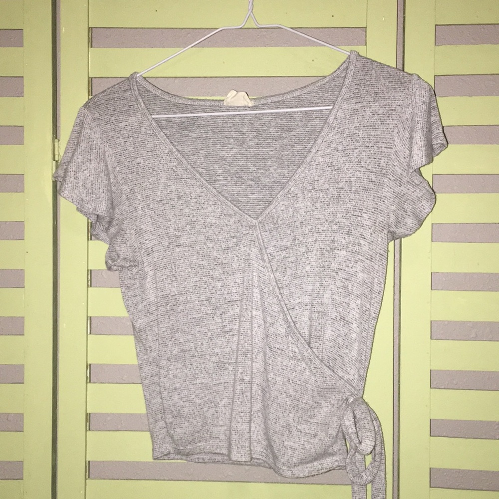 Soft & stretchy wrap around top!